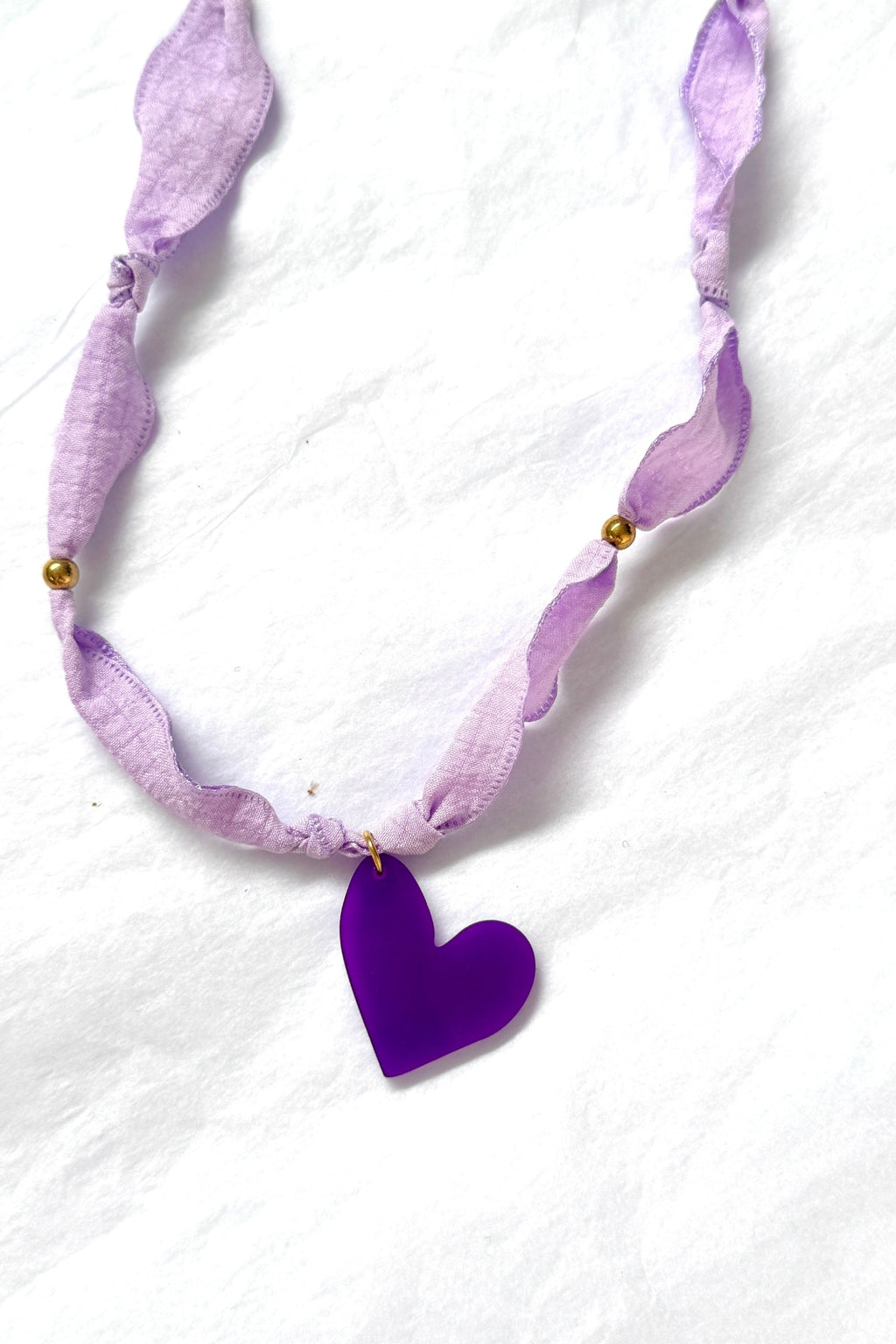 Collar corazón de melón