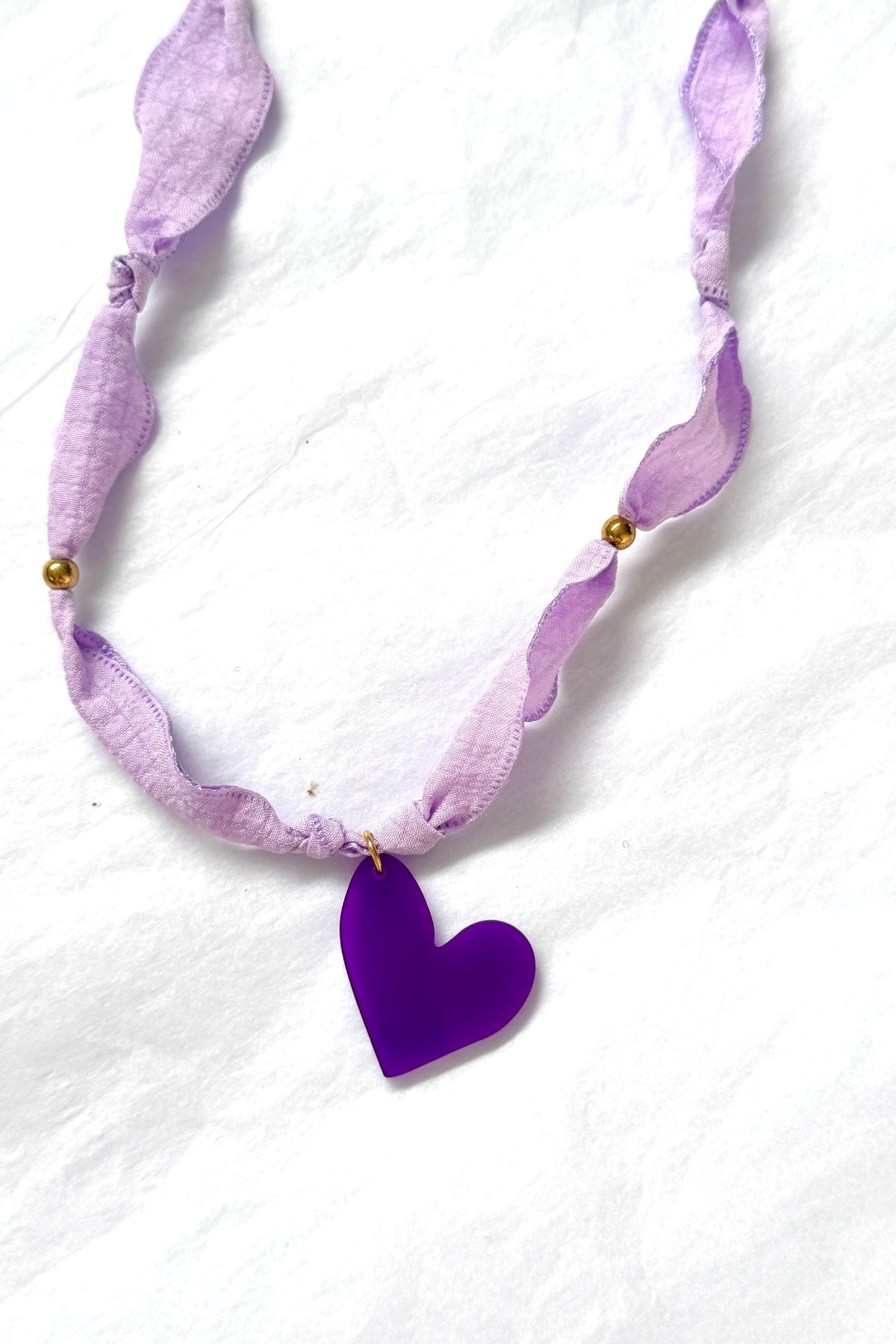 Collar corazón de melón