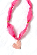 Collar corazón de melón