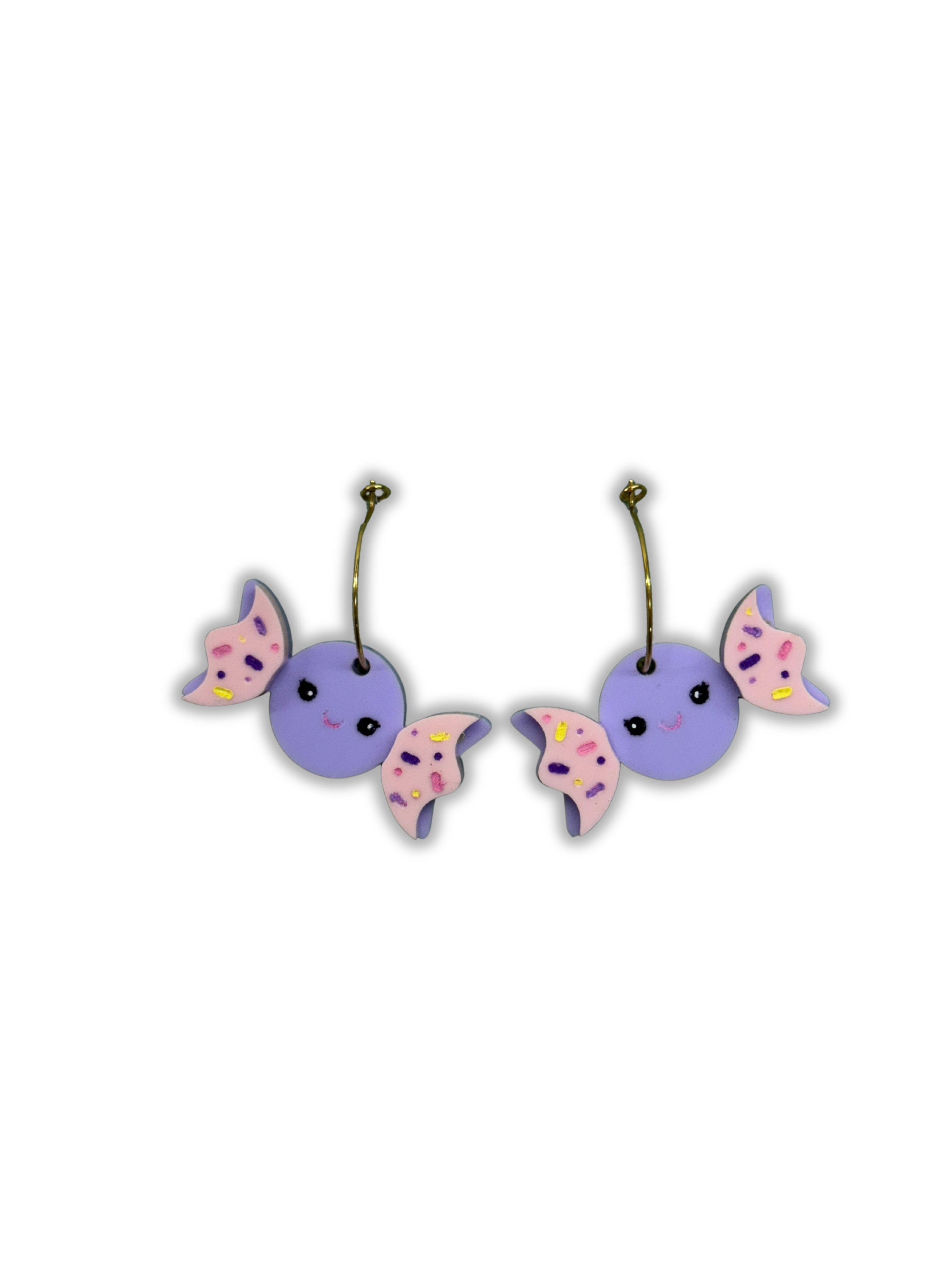 Pendientes de metacrilato ligero con diseño de caramelo colorido, colección Sugar Pop de TaRo Joyas, ideales para un estilo alegre y original. Fondo transparente color malva