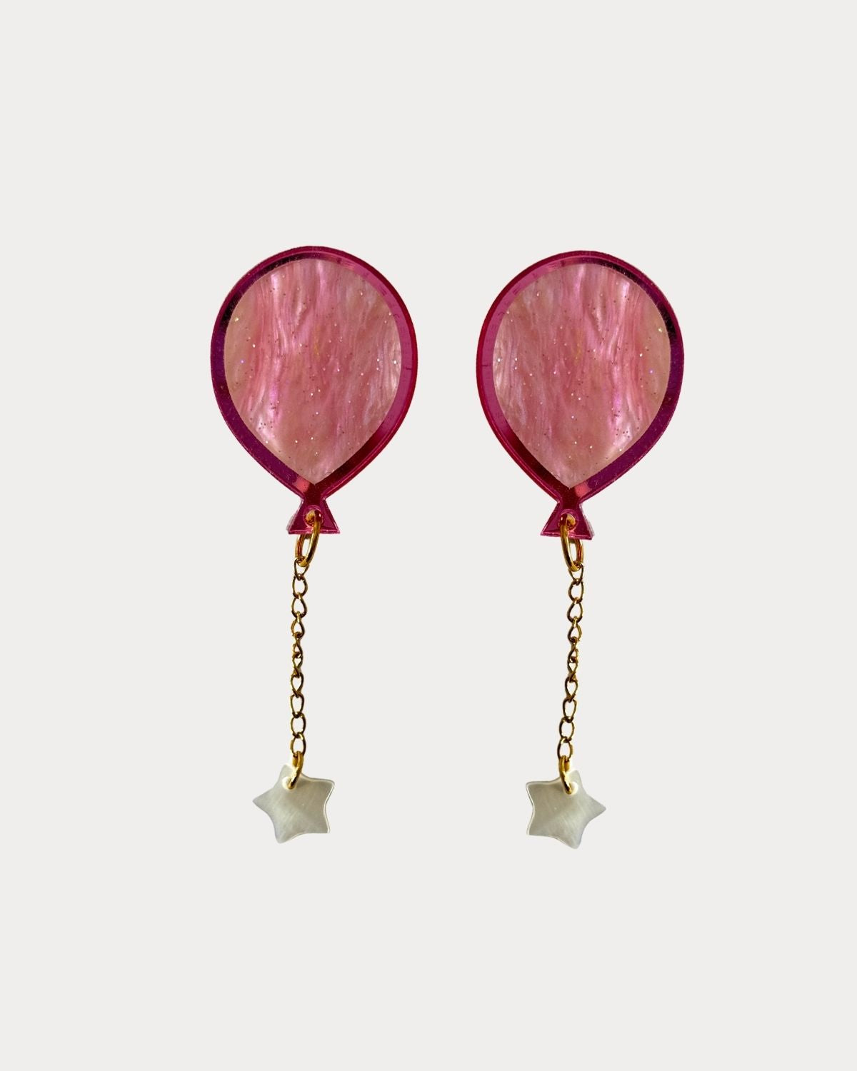 Pendientes de metacrilato ligero con diseño de globo de colores, colección Bonhomía de TaRo Joyas, perfectos para un estilo divertido y colorido.