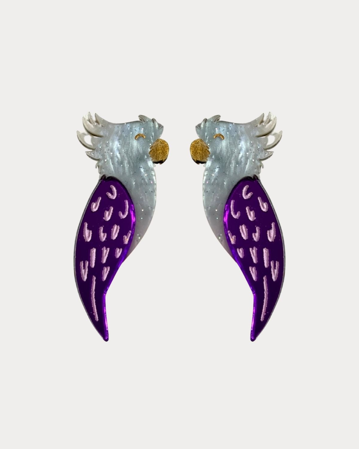 Pendientes TaRo Joyas de metacrilato ligero con diseños de animales y huellas coloridas, colección Kukur, accesorios divertidos y originales inspirados en la naturaleza.